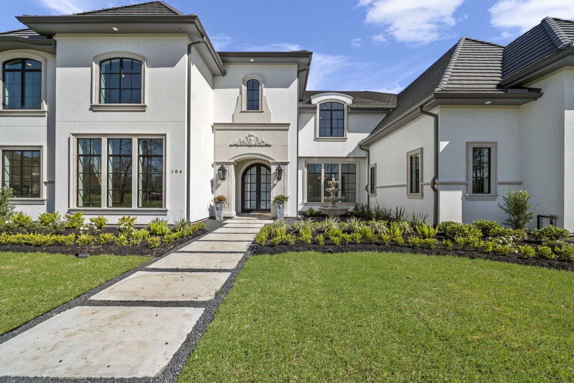Exterior of a Psalms Fine Homes French-manor residence