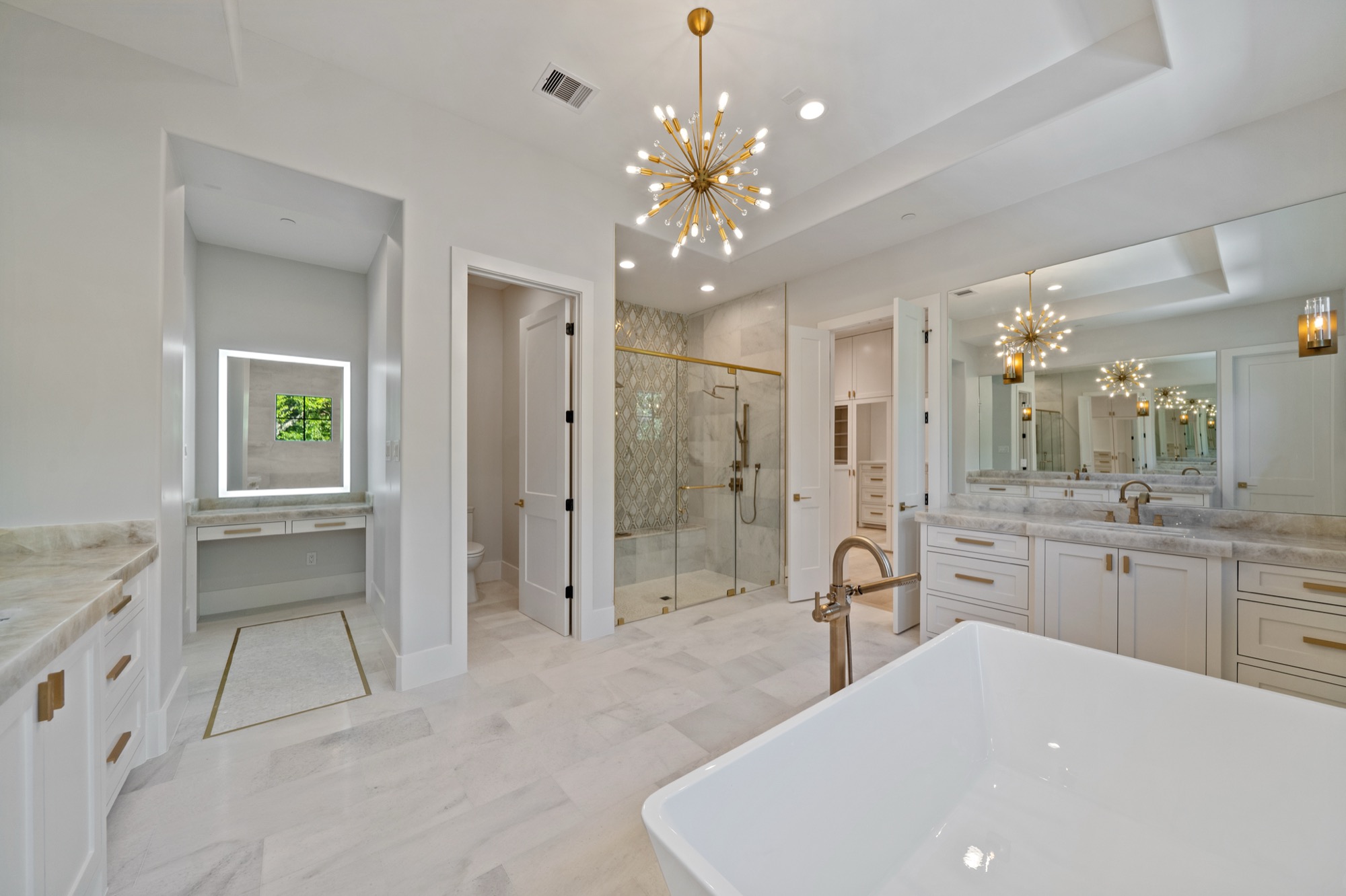 Spa-like primary bath in a custom Psalms Fine Homes residence in Memorial Villages