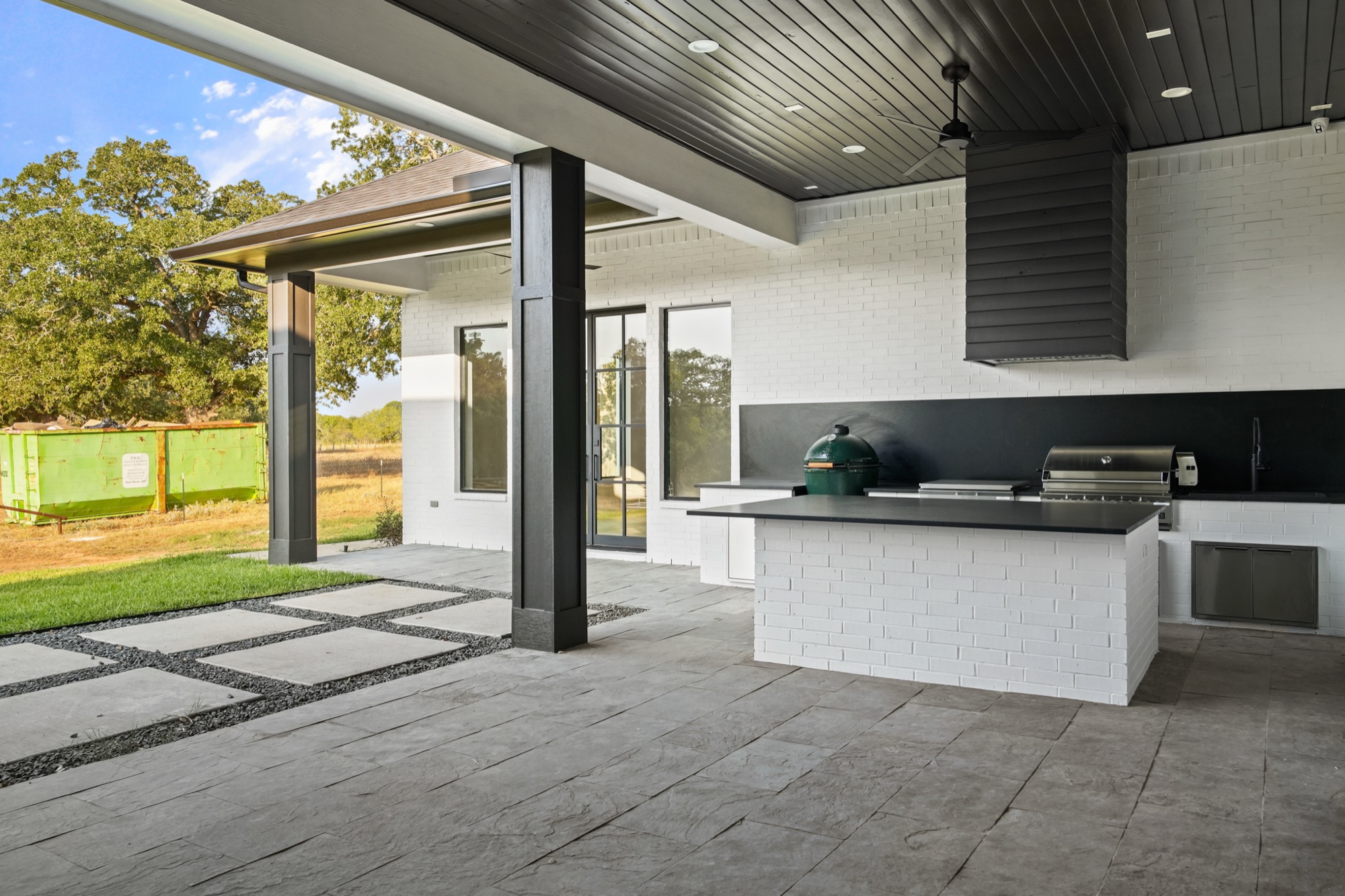 Outdoor entertainment space at a Psalms Fine Homes Smithville residence